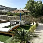 Minimal Grey Pool-front In Parikia (Paros)