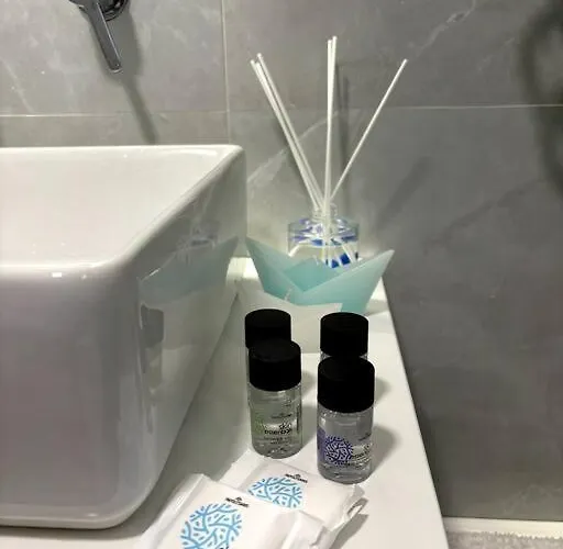 Minimal Grey Pool-front In Lejlighed